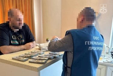 Фото 6 — ДБР затримало п'ятьох учасників схеми з перереєстрації нерухомості Мегабанку на 360 мільйонів (ФОТО)
